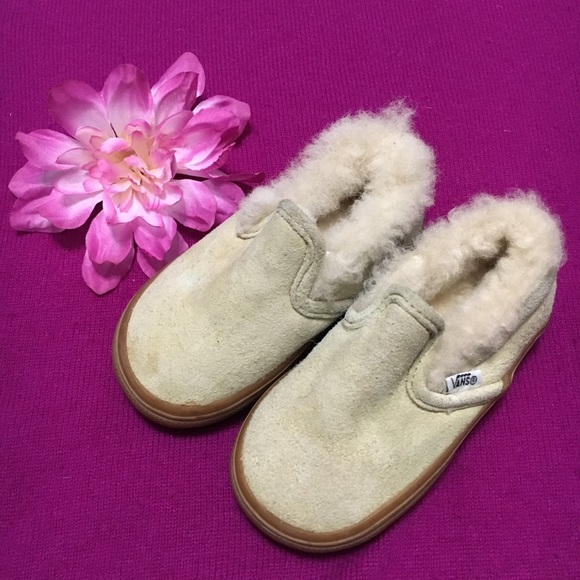 pink vans with fur inside